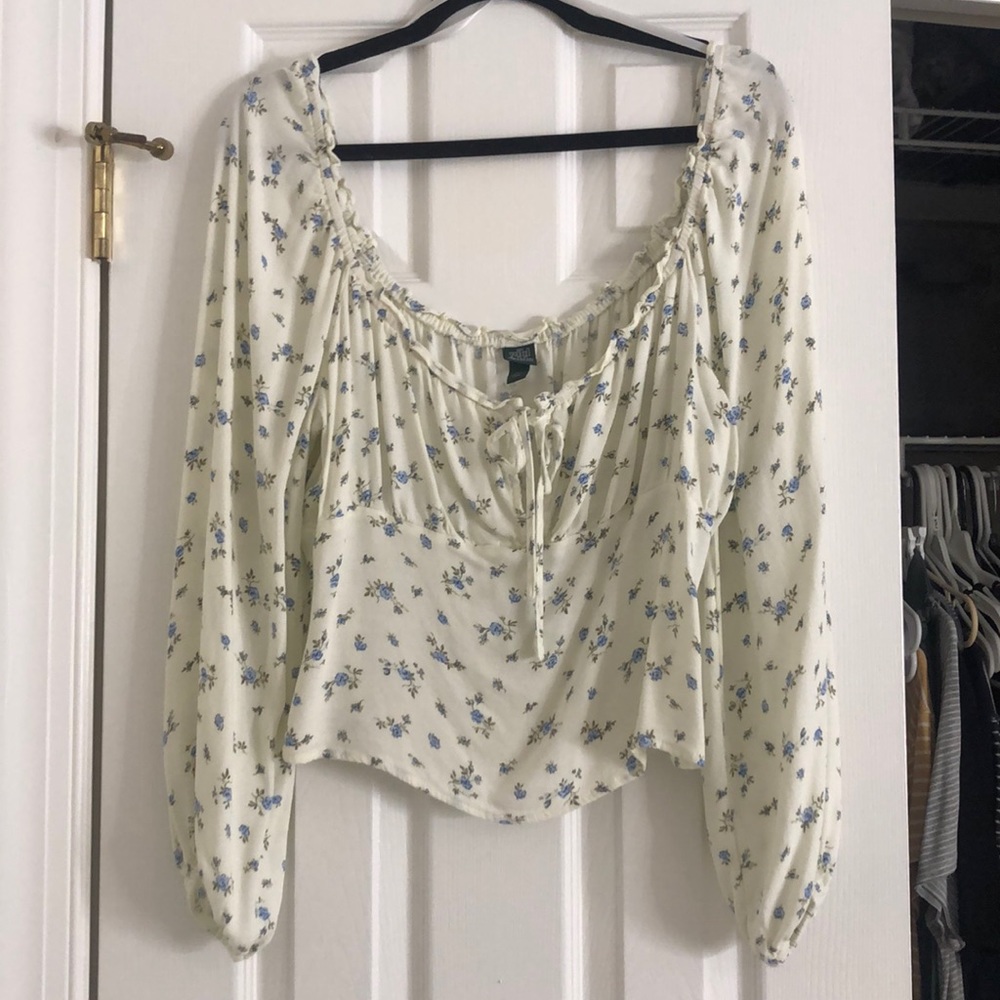 Cream colored long sleeve top with front tie!